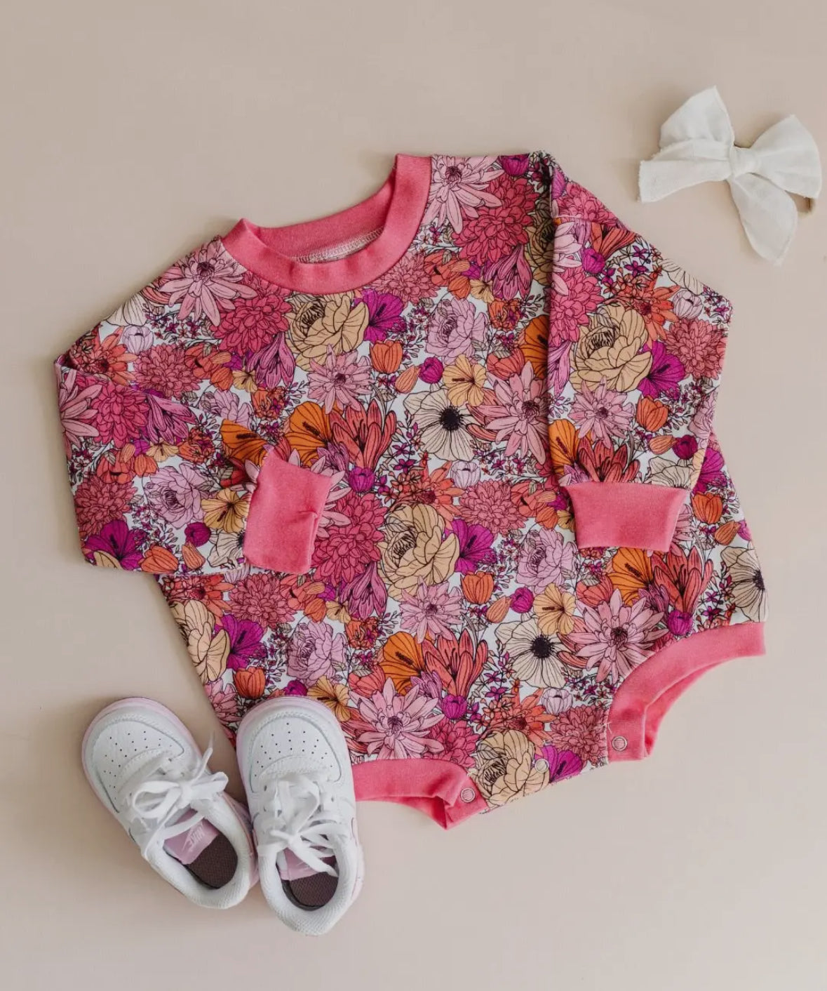 Pink floral bubble romper